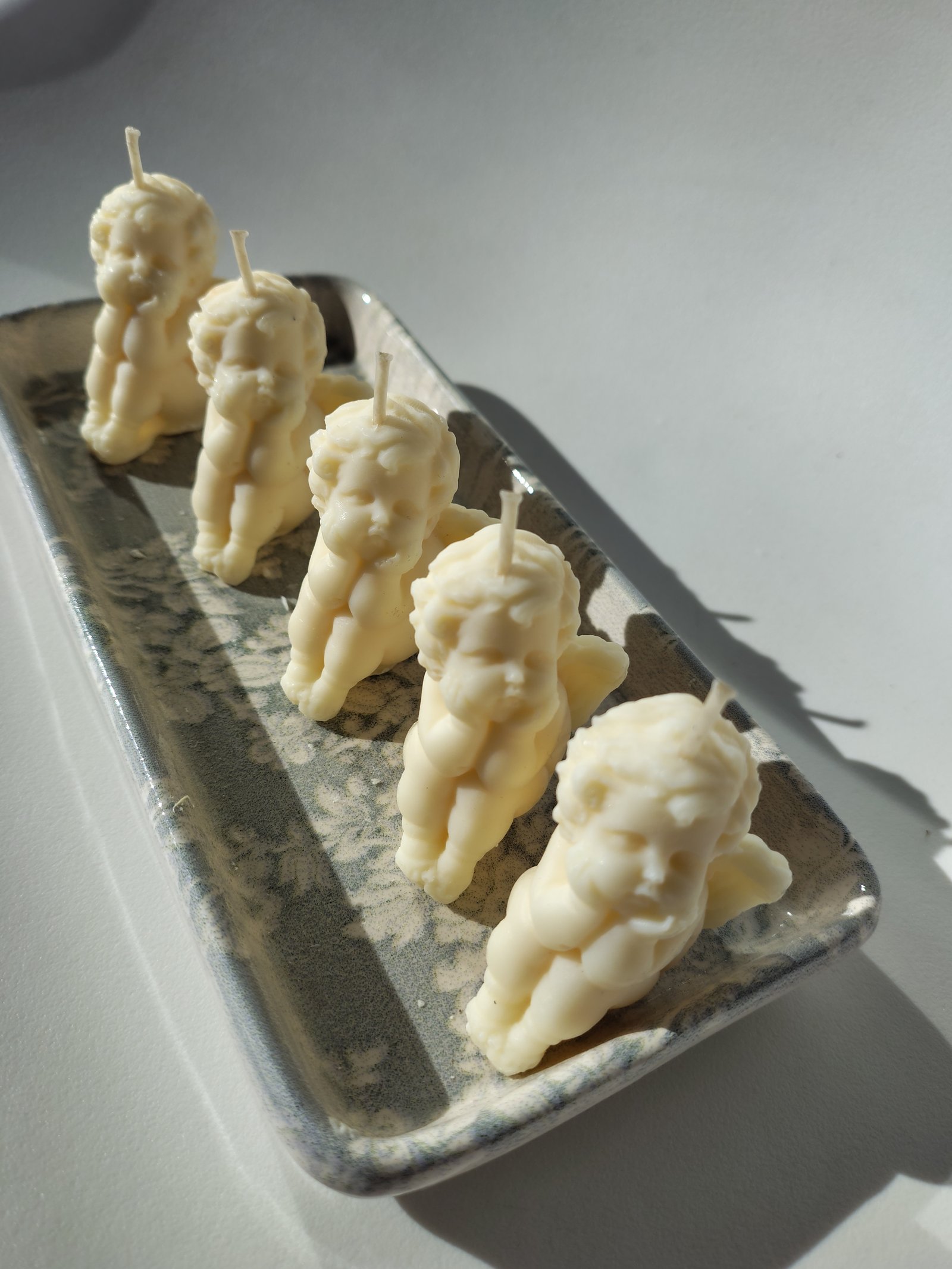 Vela Angelito Sentado